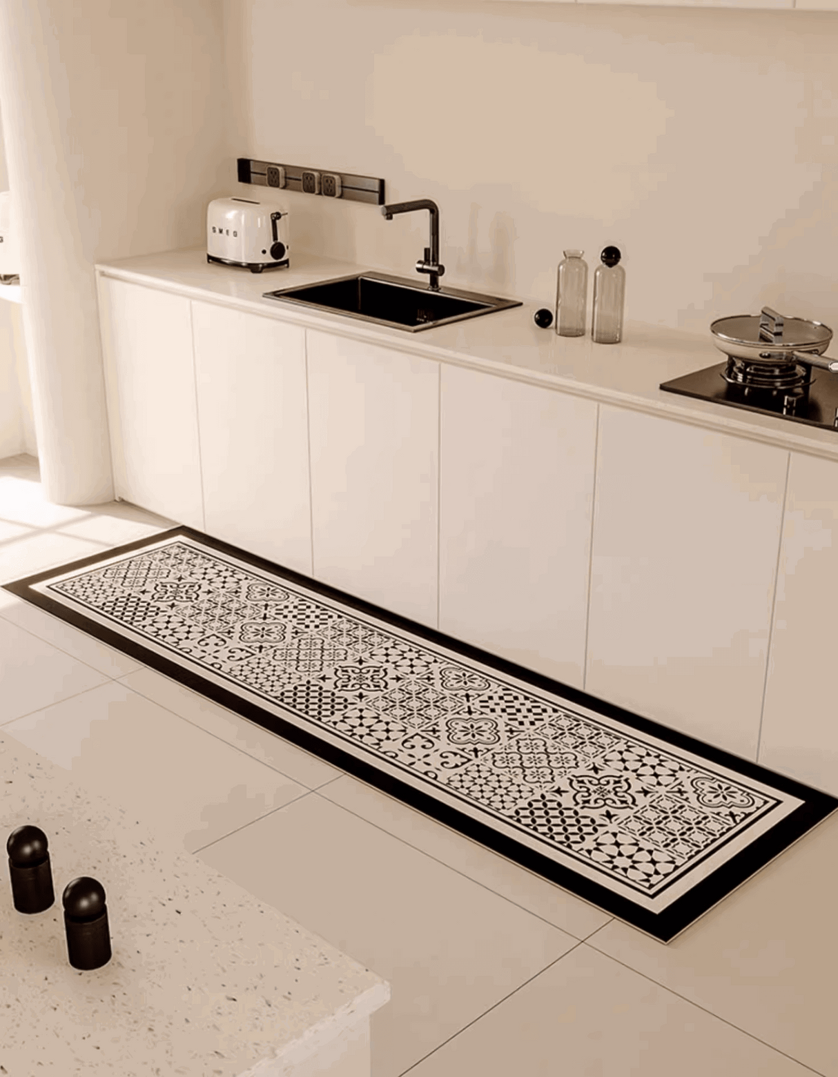 The Classic Patchwork Kitchen Mat features a geometric mosaic tile pattern that complements your home decor. It also prevents accidental slips and spills in the kitchen.