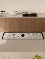 Palm Botanical Kitchen Mat features minimal black and white tropical jungle design. Our stain-resistant and water-proof kitchen rug is perfect for a busy kitchen! 