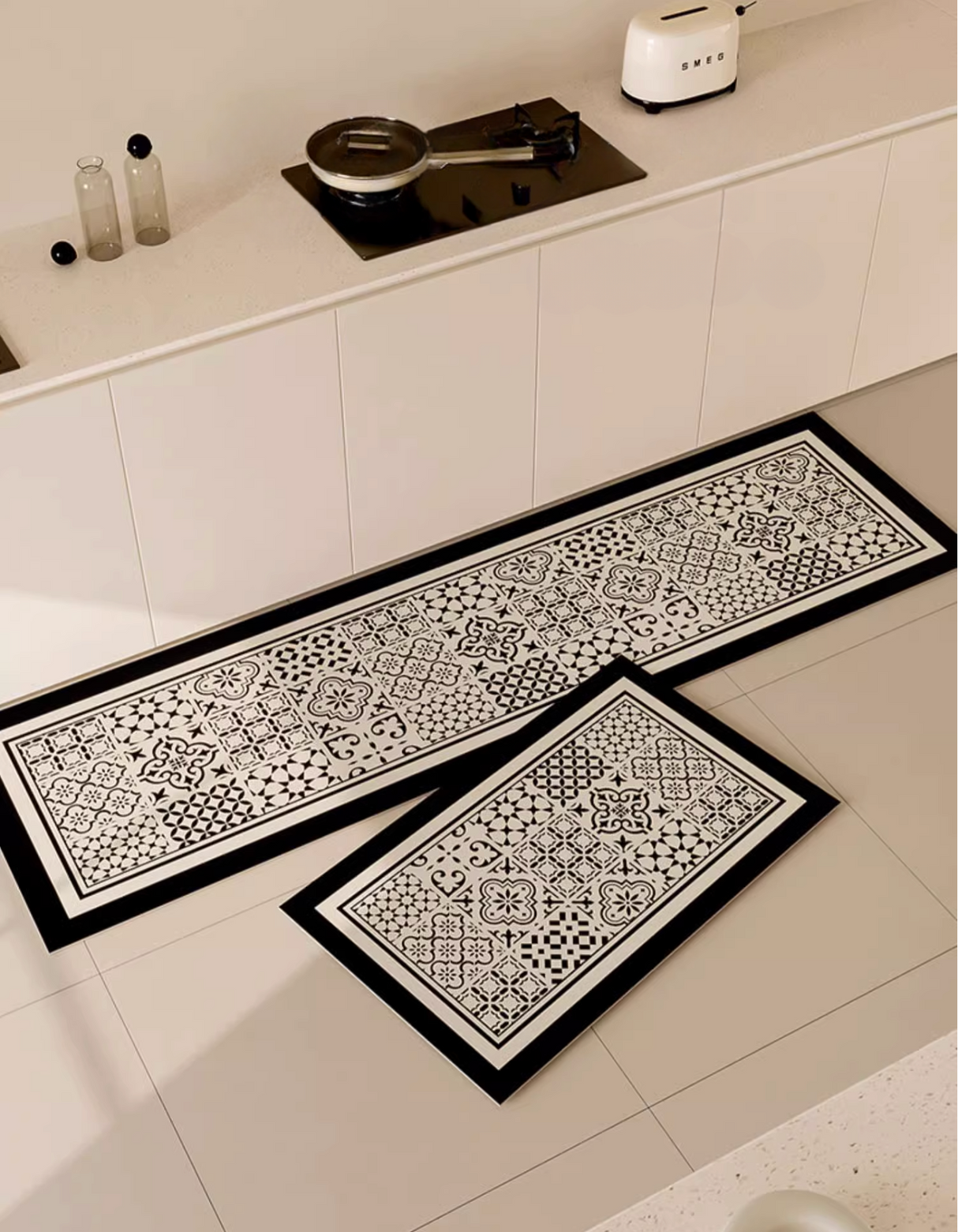 The Classic Patchwork Kitchen Mat features a geometric mosaic tile pattern that complements your home decor. It also prevents accidental slips and spills in the kitchen. 